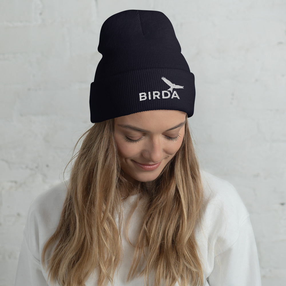 cuffed Bird beanie navy on a lady